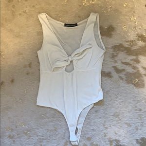 White stretchy body suit